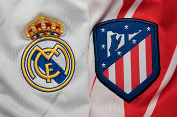 Escudos del Real Madrid y Atlético de Madrid
