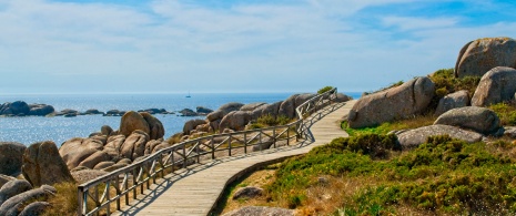 View of the wooden walkway that covers the seafront path at San Vicente do Mar, O Grove