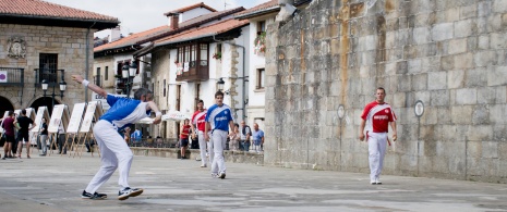 Players in a game of Basque pelota