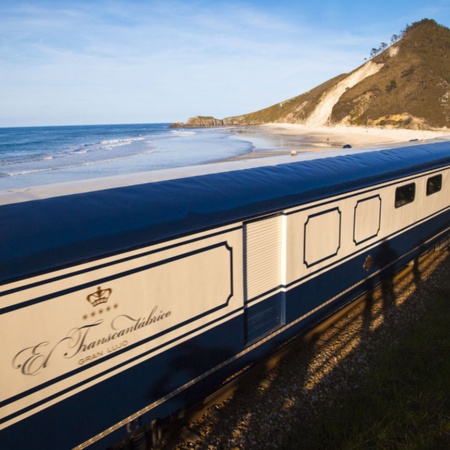 Transcantábrico Train in San Antolín beach, Asturias