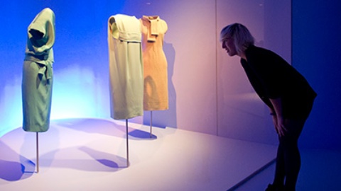 Visitor at an exhibition of Cristobal Balenciaga outfits at the Cristobal Balenciaga Museum in Getaria