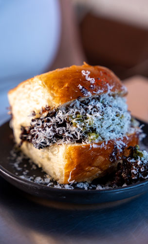 Bocadillo de bochecha com queijo Tulha
