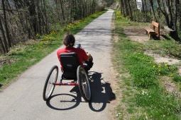 Person with reduced mobility on a greenway