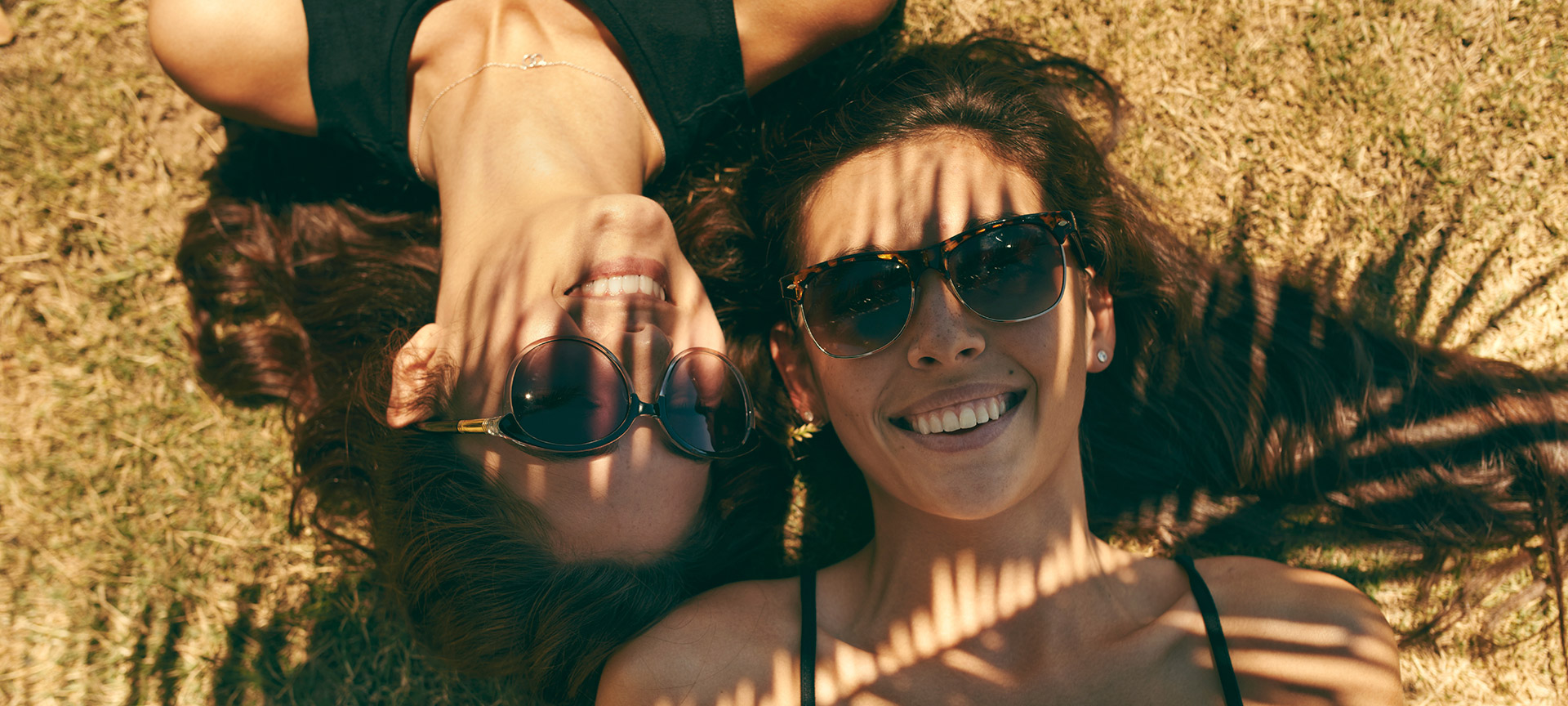 A group of happy girls sunbathing