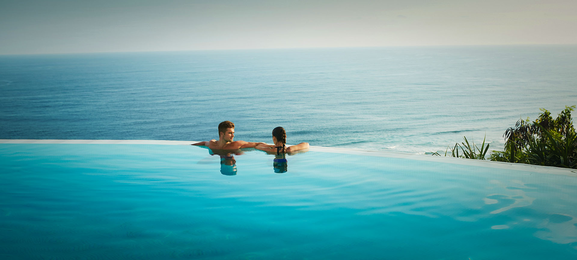 Tourists relaxing in a pool