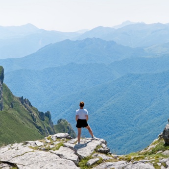 Tourist on a mountain peak