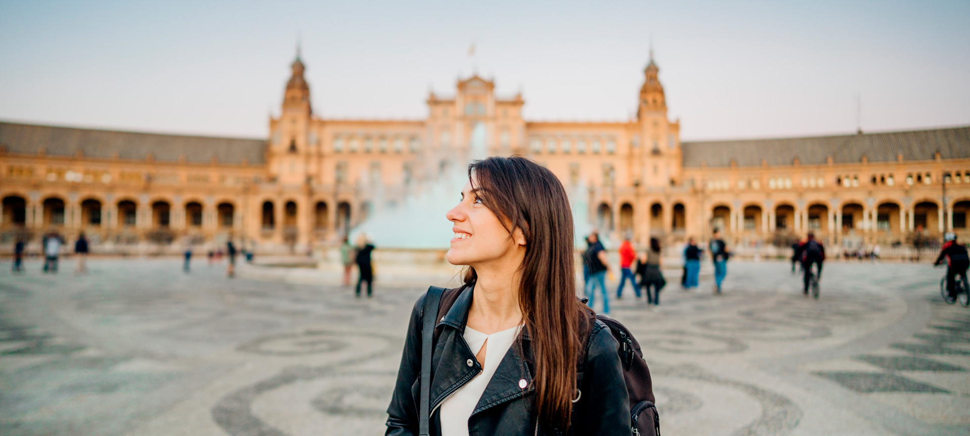 Woman visiting Plaza España in Seville Woman visiting Plaza España in Seville