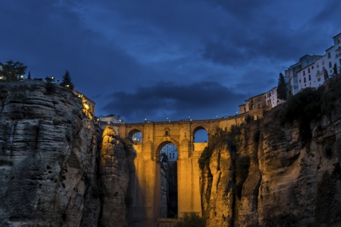 "View of the famous New Bridge in Ronda at night, in Malaga (Andalusia) "