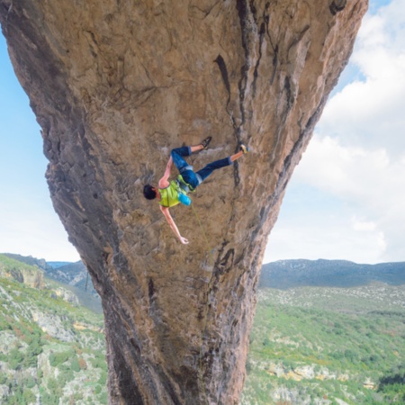 Tourist rock climbing in Rodellar in Huesca, Aragon