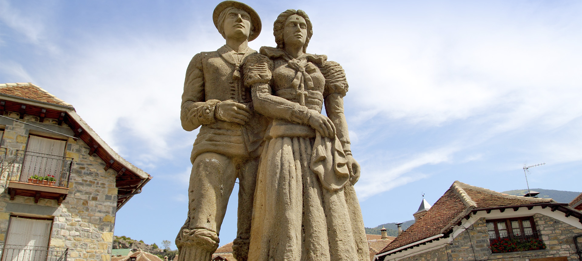 Sculpture of the traditional “chesco” dress in Hecho (Huesca, Aragon)
