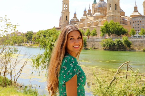 Tourist as the Ebro river goes through the city of Zaragoza, Aragon