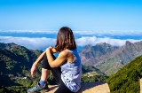 Woman looking at the mountains of Anaga, Tenerife.