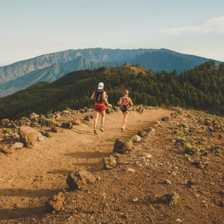 Runners along La Crestería in La Palma, Canary Islands