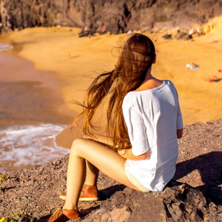 Tourist on Papagayo Beach, Lanzarote.