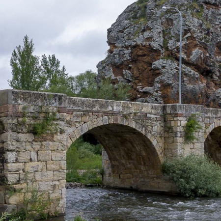 Stone bridge over the River Pisuerga in Cervera de Pisuerga (Palencia, Castilla y Leon)