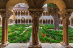 Visit the cloister at the Monastery of Santo Domingo de Silos, Castilla y Leon.