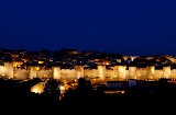 Avila city walls by night