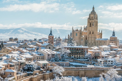 View of the Cathedral and the snow-covered city of Segovia, Castile and Leon