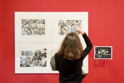 Tourist visiting an exhibition at the MNAC in Barcelona, Catalonia