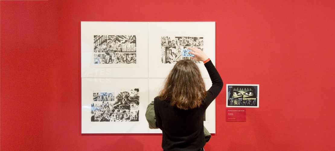 Tourist visiting an exhibition at the MNAC in Barcelona, Catalonia
