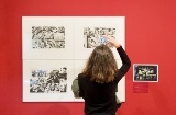 Tourist visiting an exhibition at the MNAC in Barcelona, Catalonia