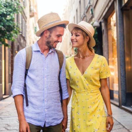 Tourists strolling in a commercial street of Barcelona, Catalonia