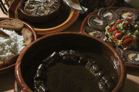 Tasting dishes at the Lamprey Festival in Arbo (Pontevedra, Galicia)