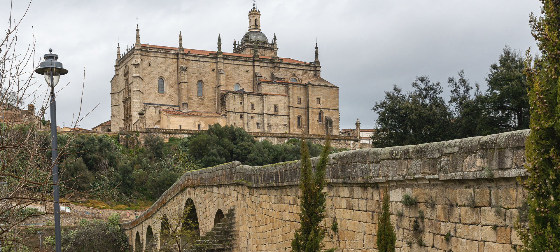 Stone bridge and Cathedral of Santa María de la Asunción in Coria (Cáceres, Extremadura)