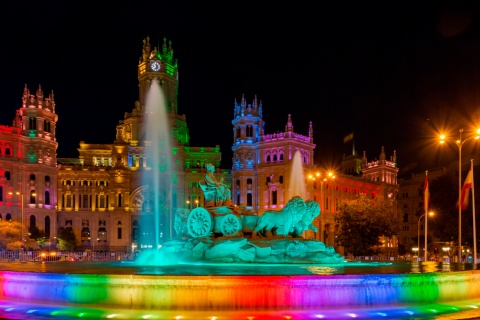 Plaza Cibeles lit up for Madrid Pride (MADO), region of Madrid