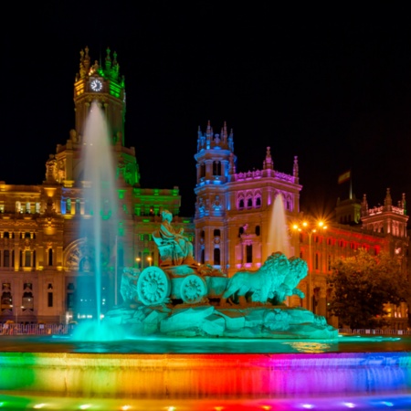 Plaza Cibeles lit up for Madrid Pride (MADO), region of Madrid