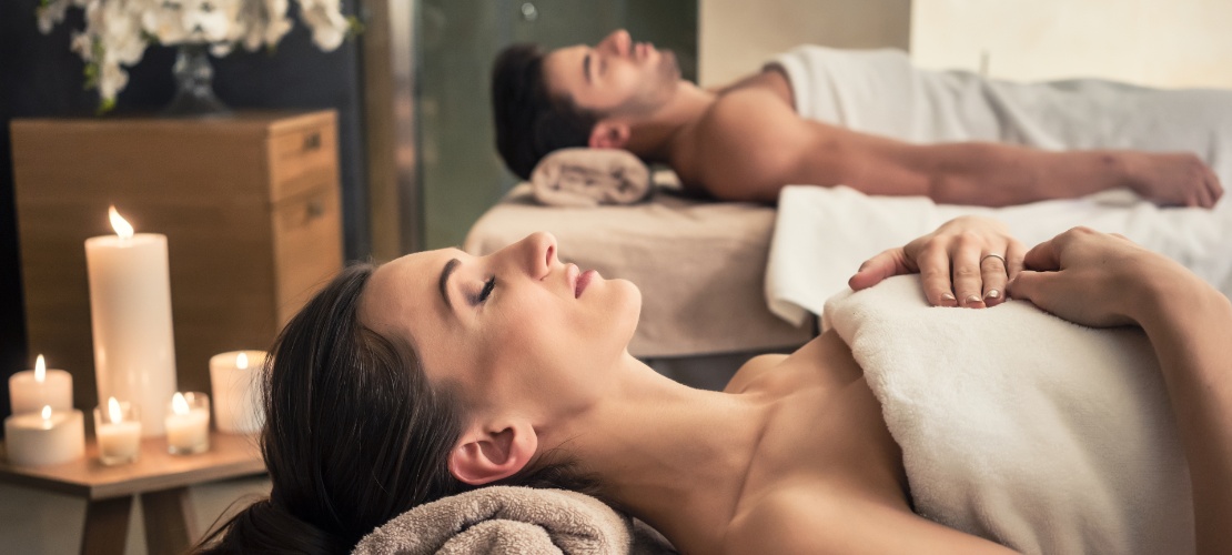 Couple relaxing during a spa treatment