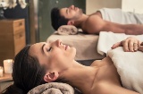 Couple relaxing during a spa treatment