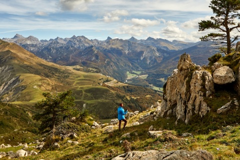 Walker looking at the view in Belagua, on the slopes of Lakartxela