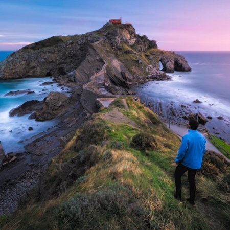 Tourist in San Juan Gaztelugatxe, Basque Country