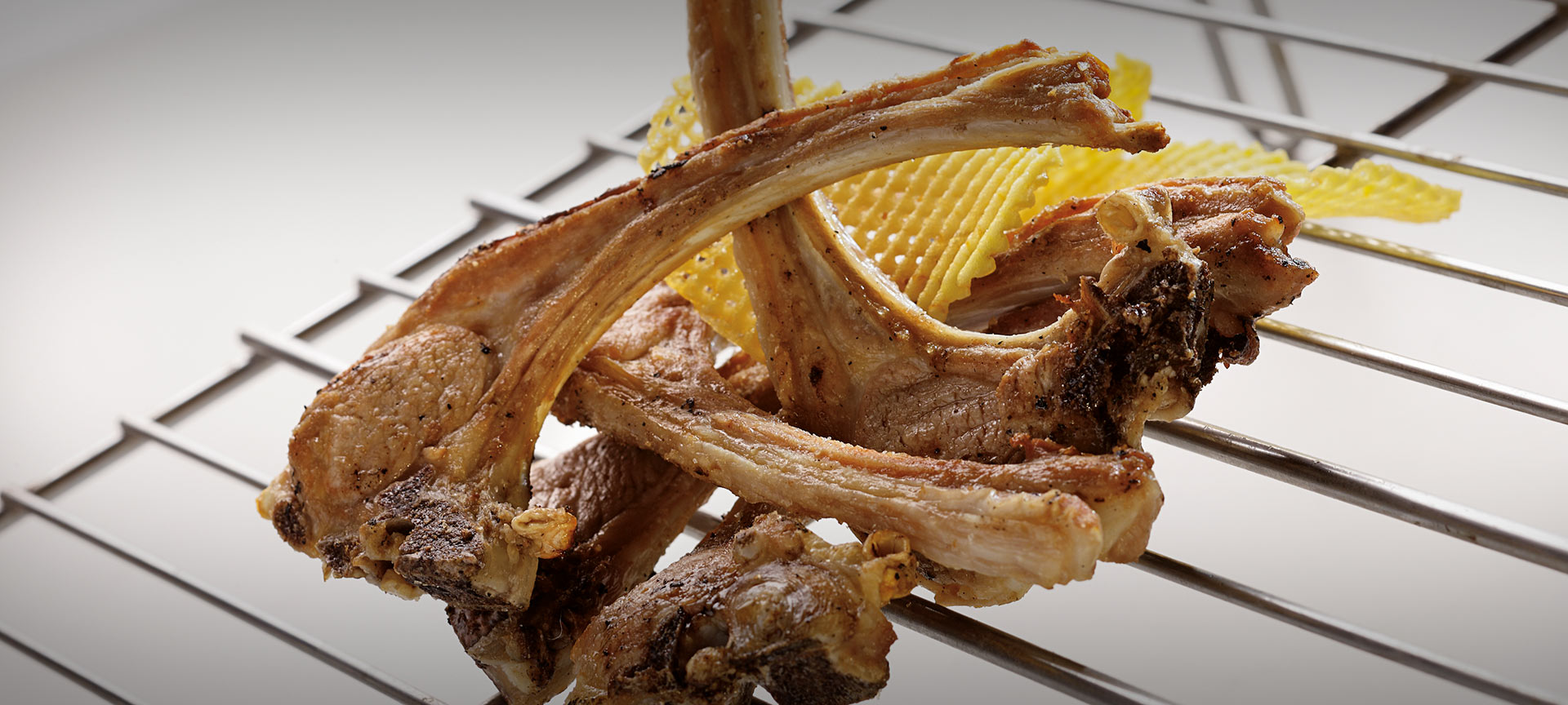 Chuletillas de cordero asadas al sarmiento Chuletillas de cordero asadas al sarmiento