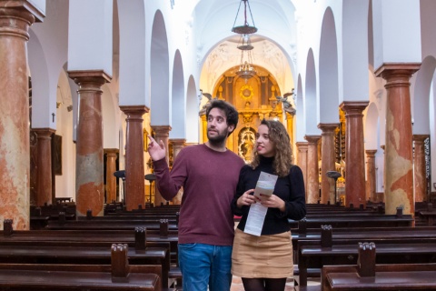 Tourists visiting the church of Asunción y Ángeles de Cabra in Córdoba, Andalusia