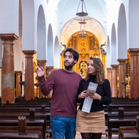 Tourists visiting the church of Asunción y Ángeles de Cabra in Córdoba, Andalusia