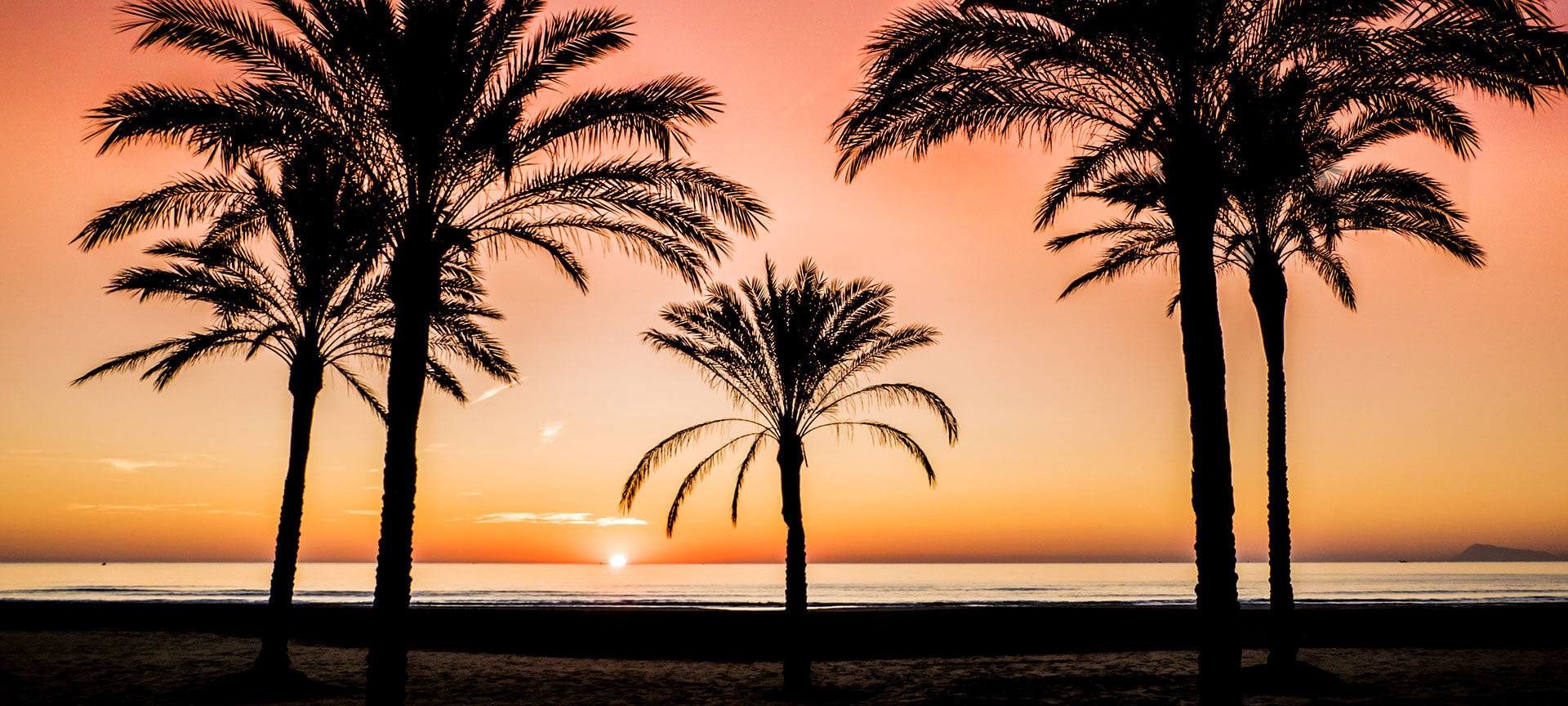 Wschód słońca na plaży Cullera, C. Valenciana