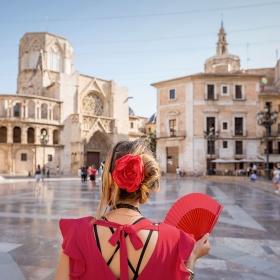 Tourist in the Plaza de la Virgen in Valencia Tourist in the Plaza de la Virgen in Valencia