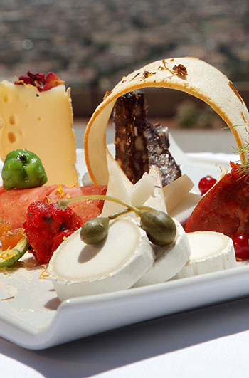 Parador de Lorca with a selection of cured meats and cheeses from the region