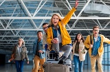 Group of friends at an airport