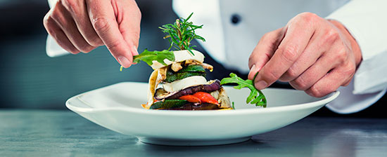 Chef plating food