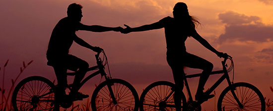 Couple on bicycles