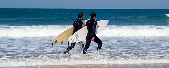 Surfers on the beach