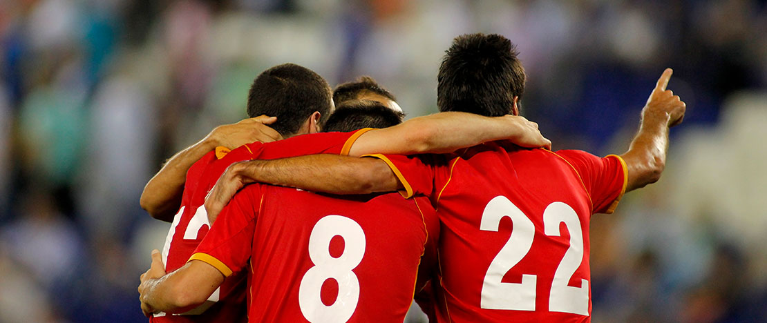 Players celebrating a goal