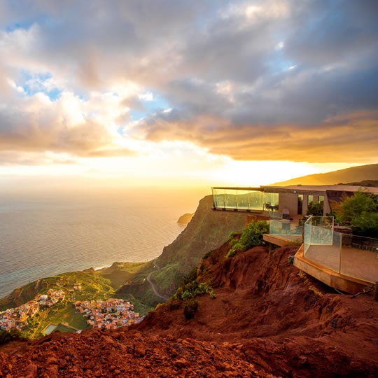 Mirador de Abrante building with its glass observation balcony overlooking the village of Agulo on the island of La Gomera
