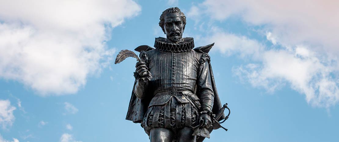 Detail of the statue of Miguel de Cervantes