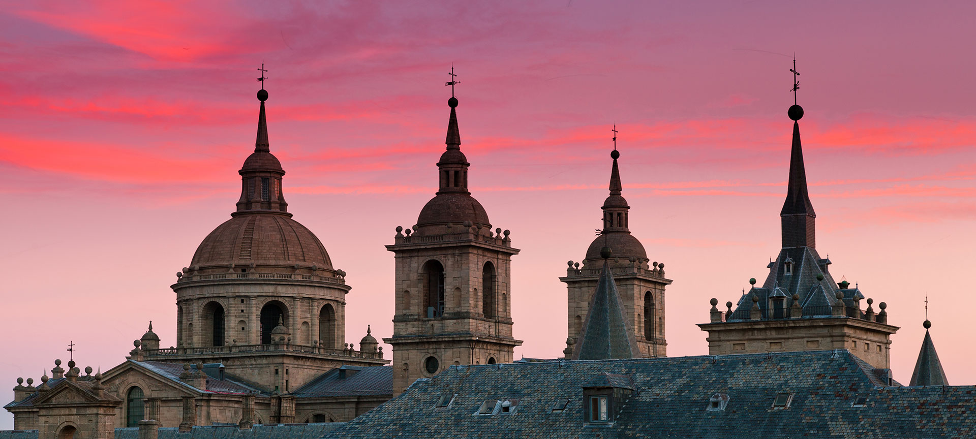  Views of the roof tiles of El Escorial Monastery at sunset in San Lorenzo de El Escorial, Madrid