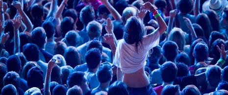 Young woman in a concert audience