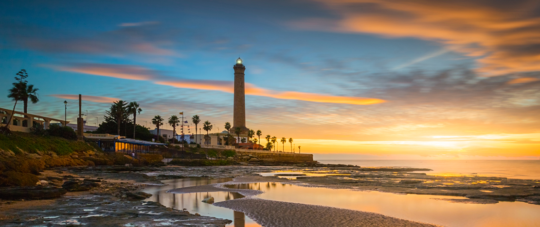 Lighthouse on the beach of Las Canteras de Chipiona in Cadiz, Andalusia Lighthouse on the beach of Las Canteras de Chipiona in Cadiz, Andalusia